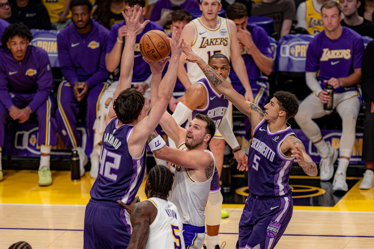 Los Angeles Lakers guard Luka Doncic (77) successfully shooting the ball during an NBA basketball game against the Sacramento Kings on March 1st, 2026 in Los Angeles, CA.