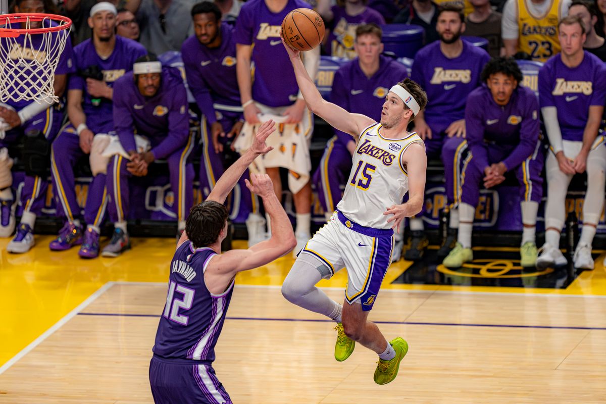 Los Angeles Lakers guard Austin Reeves (15) putting the ball up to shoot unsuccessfully during an NBA basketball game against the Sacramento Kings on March 1st, 2026 in Los Angeles, CA.