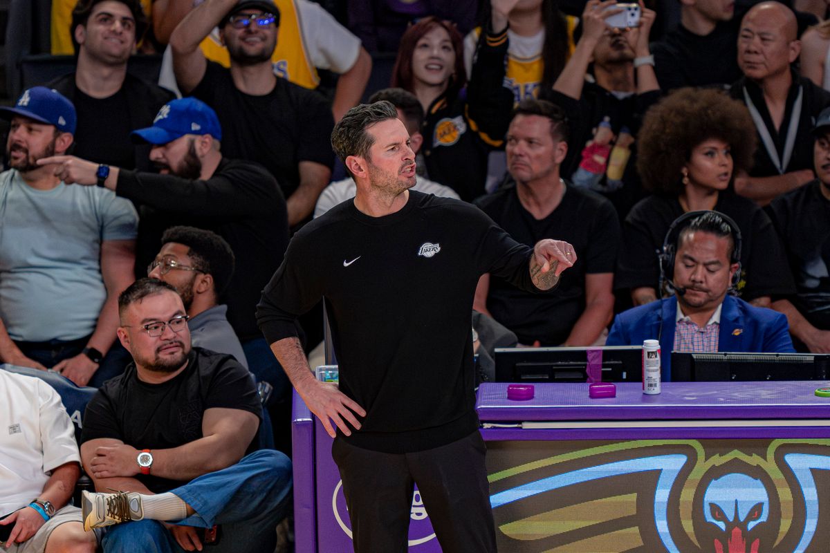 Los Angeles Lakers coach J.J. Reddick pointing out a foul during an NBA basketball game against the Sacramento Kings on March 1st, 2026 in Los Angeles, CA.