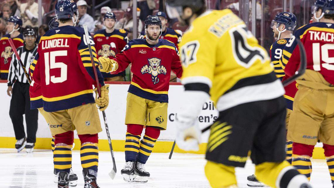 Florida Panthers defenseman Uvis Balinskis (26) celebrates after scoring against the Boston Bruins in the second period of their NHL game at the Amerant Bank Arena on Wednesday, Feb. 4, 2026, in Sunrise, Fla.