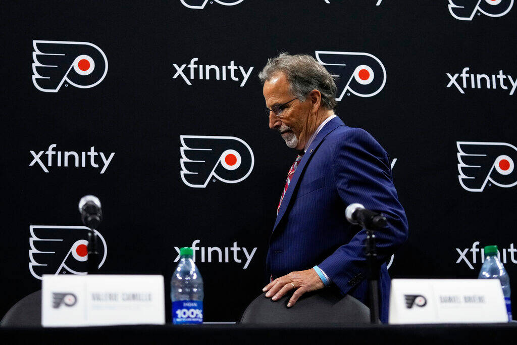 FILE - John Tortorella, Philadelphia Flyers head coach, arrives for a news conference at the NH ...