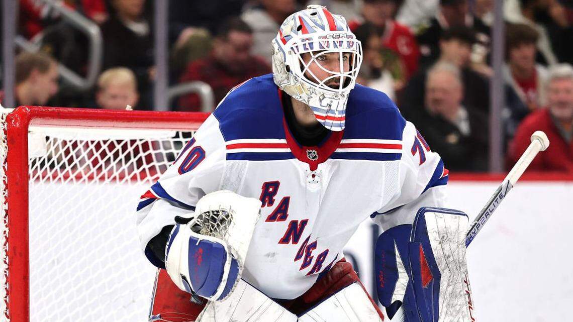 CHICAGO, ILLINOIS - JANUARY 05: Louis Domingue #70 of the New York Rangers tends the net against the Chicago Blackhawks during the third period at the United Center on January 05, 2025 in Chicago, Illinois. (Photo by Michael Reaves/Getty Images)
