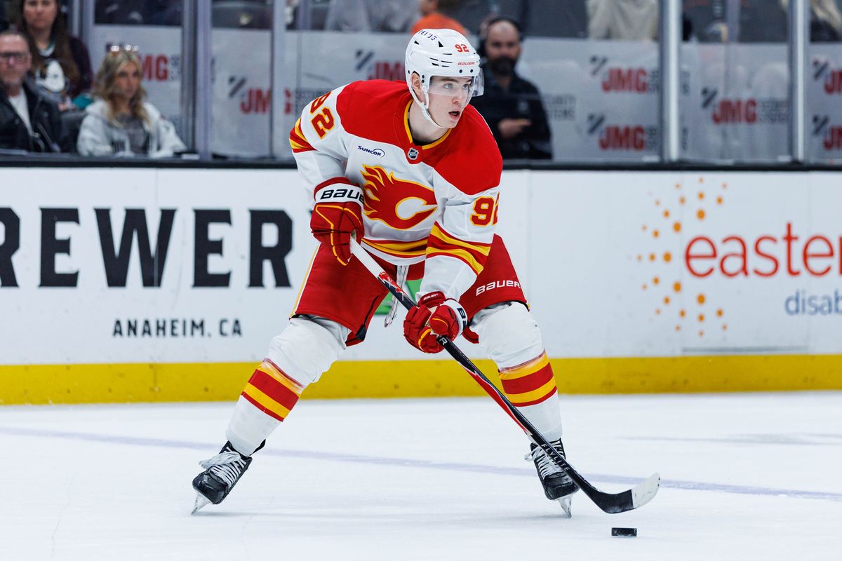 Calgary Flames right wing Matvei Gridin (92) looks to pass the puck during an NHL match against the Anaheim Ducks on March 1, 2026 in Anaheim, California.