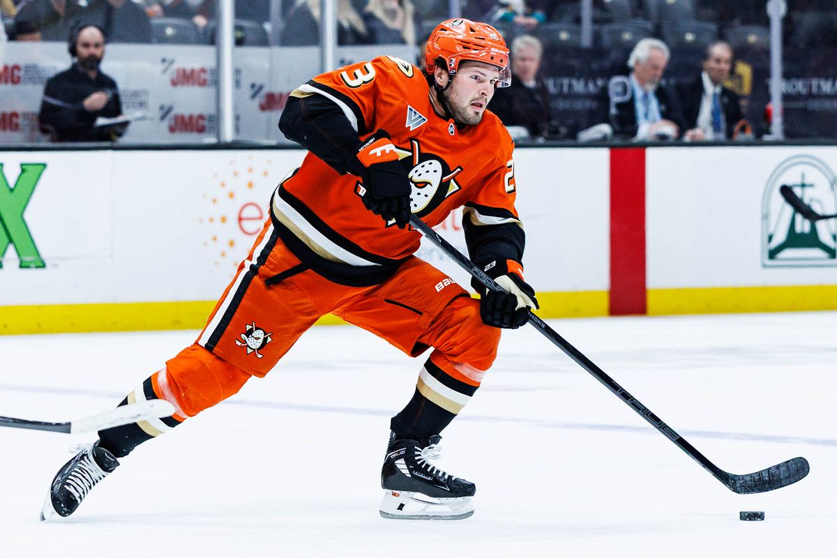 Anaheim Ducks center Mason McTavish (23) looks to pass the puck during an NHL match against the Calgary Flames on March 1, 2026 in Anaheim, California.
