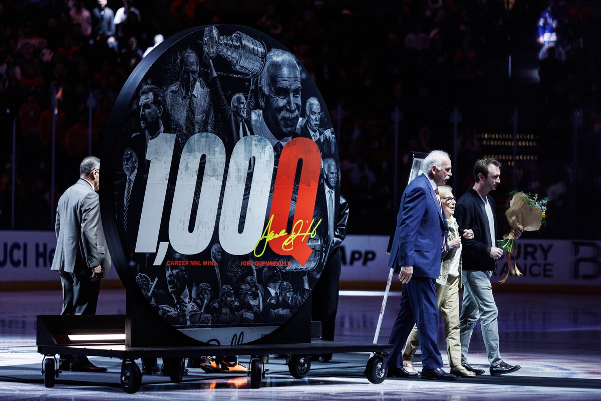 Anaheim Ducks head coach Joel Quenneville is celebrated on his 1,000th NHL win before an NHL match against the Calgary Flames on March 1, 2026 in Anaheim, California.