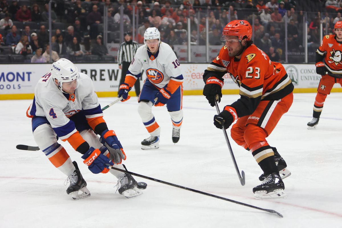 Anaheim Ducks center Mason McTavish (23) passes the puck during an NHL game against the New York Islanders on March 4, 2026 in Anaheim, CA.