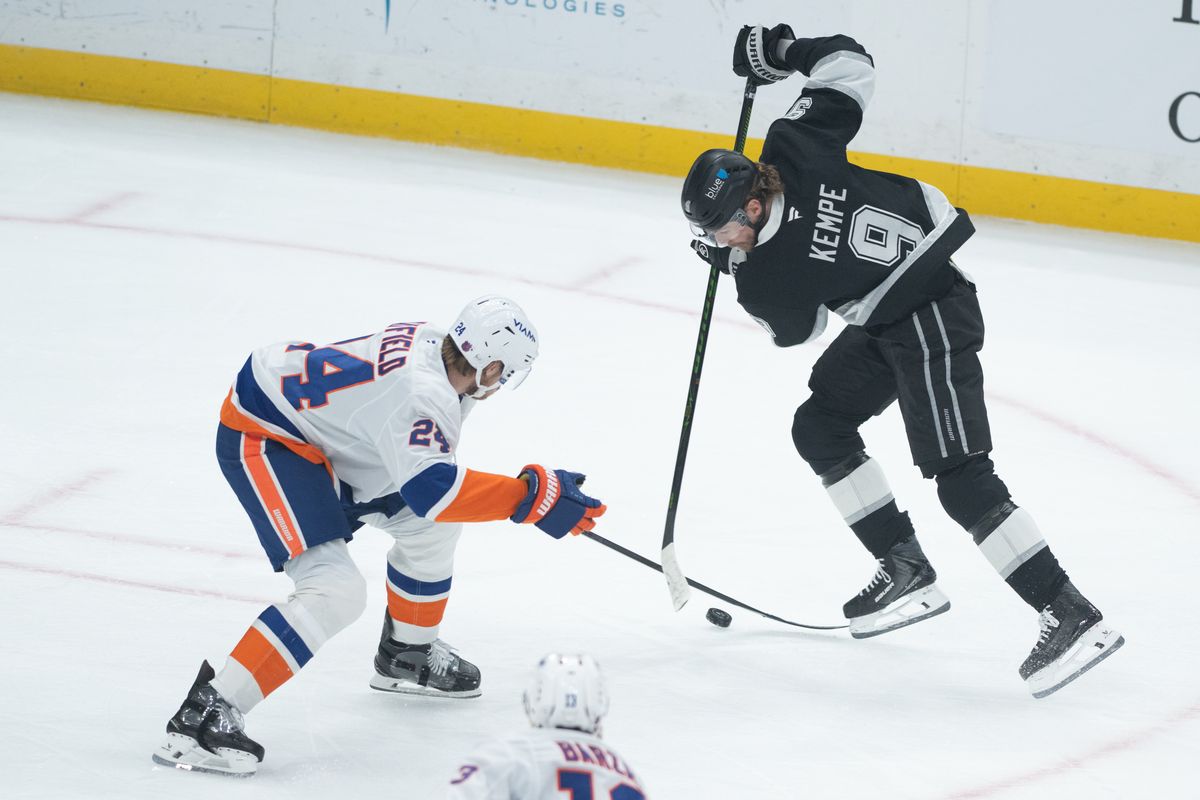LA Kings right wing Adrian Kempe (9) battles for the puck during an NHL game between the New York Islanders and the Los Angeles Kings on Thursday, March 5, 2026 at Crypto.com Arena in Los Angeles Calif