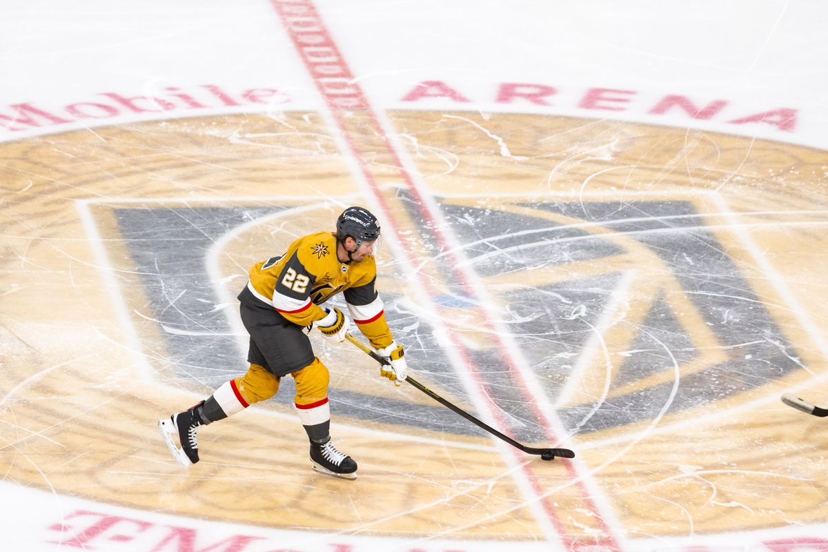 Vegas Golden Knights right-wing Cole Smith (22) skates the puck up center ice during a NHL game between the Vegas Golden Knights and the Minnesota Wild, Friday March 6, 2026 in Las Vegas, Nev.