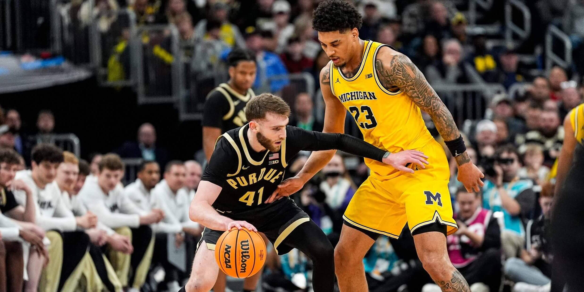 Purdue's Braden Smith and Michigan's Yaxel Lendenborg