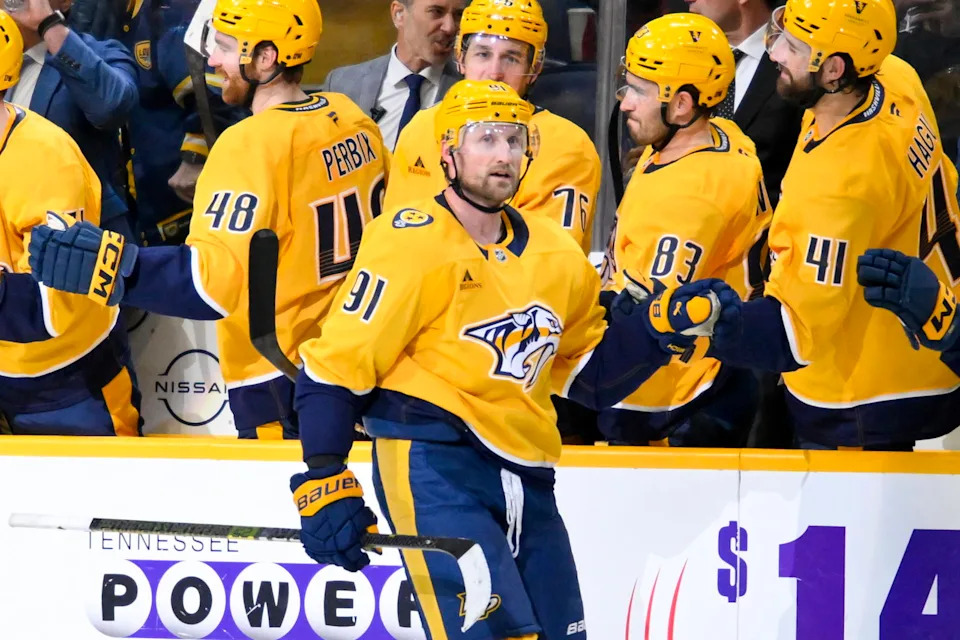 Mar 24, 2026; Nashville, Tennessee, USA; Nashville Predators center Steven Stamkos (91) celebrates with his teammates after scoring a goal against the San Jose Sharks during the second period at Bridgestone Arena. Mandatory Credit: Steve Roberts-Imagn Images