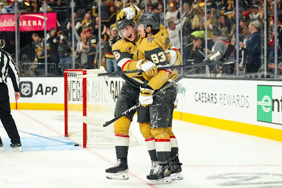Vegas Golden Knights F Pavel Dorofeyev (16) celebrates with his teammate Vegas Golden Knights F Mitch Marner (93) after Marner scored a goal against the Pittsburgh Penguins on Thursday, March 12, 2026, in Las Vegas, Nevada. 