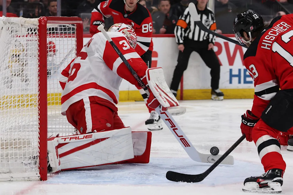Detroit Red Wings goaltender John Gibson (36) uses his stick to make a stop against the New Jersey Devils during the second period at Prudential Center in Newark, New Jersey, on Sunday, March 8.