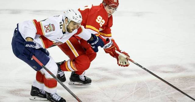 Panthers' A.J. Greer suspended for 3 games for shoving Flames' Connor Zary into the boards