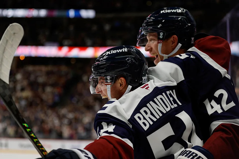 Brindley celebrating with Josh Manson. Credit: Isaiah J. Downing