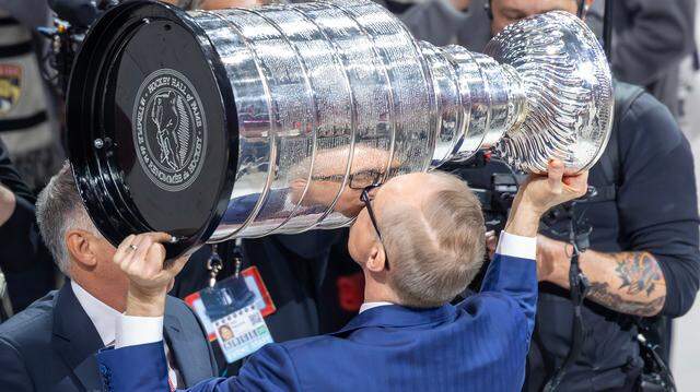 Florida Panthers head coach Paul Maurice kisses the Stanley Cup after a 5-1 win over the Edmonton Oilers in Game 6 of the Final at Amerant Bank Arena in Sunrise, Fla., on Tuesday, June 17, 2025, securing the NHL championship. Florida Panthers head coach Paul Maurice kisses the Stanley Cup after a 5-1 win over the Edmonton Oilers in Game 6 of the Final at Amerant Bank Arena in Sunrise, Fla., on Tuesday, June 17, 2025, securing the NHL championship.
