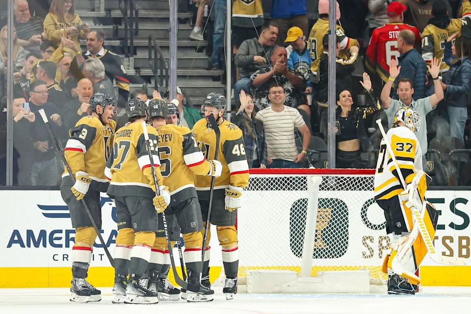 Vegas Golden Knights F Pavel Dorofeyev (16) celebrates with his teammates after scoring his second goal of the night against the Pittsburgh Penguins on Thursday, March 12, 2026, in Las Vegas, Nevada. 