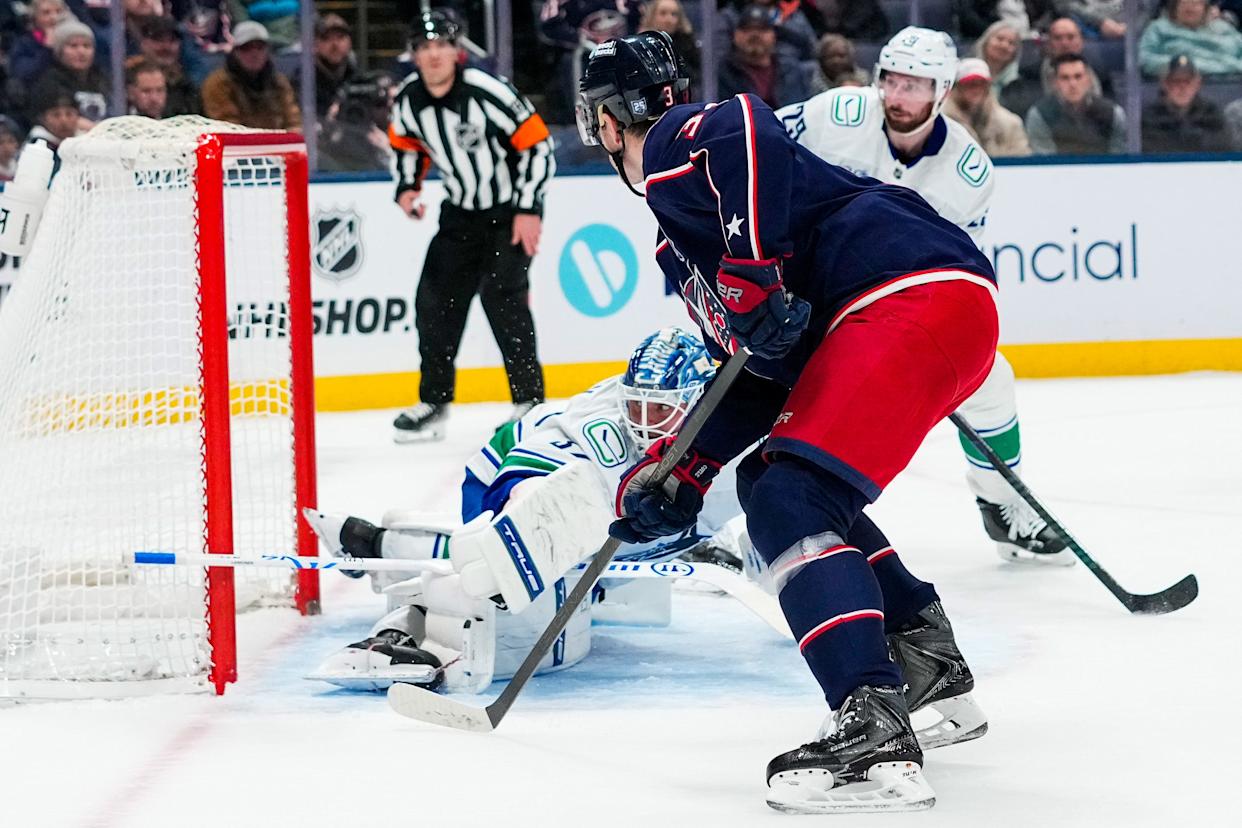 Blue Jackets center Charlie Coyle shoots and scores against the Canucks on Jan. 15.