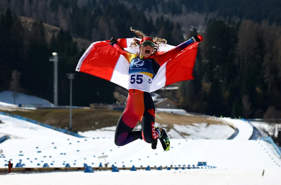 Milano Cortina 2026 Paralympics - Para Biathlon - Women's Individual Standing - Tesero Cross-Country Skiing Stadium, Lago, Italy - March 08, 2026. Gold medallist Natalie Wilkie of Canada celebrates after winning the women's individual standing REUTERS/Sarah Meyssonnier     TPX IMAGES OF THE DAY