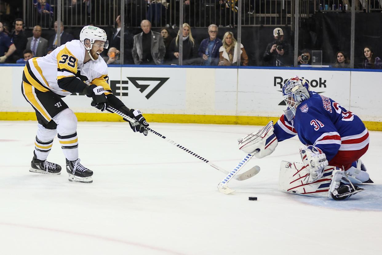 Pittsburgh Penguins right wing Anthony Mantha (39) makes a shot on goal attempt against New York Rangers goaltender Igor Shesterkin (31) during a shootout.