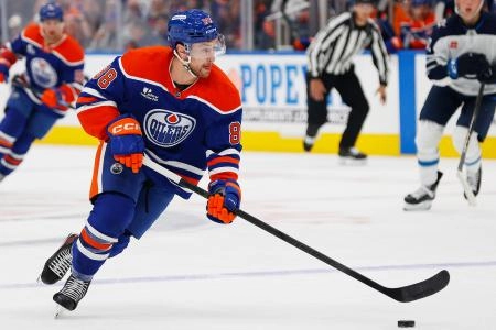 Sep 26, 2025; Edmonton, Alberta, CAN; Edmonton Oilers forward Andrew Mangiapane (88) carries the puck against the Winnipeg Jets at Rogers Place. Mandatory Credit: Perry Nelson-Imagn Images