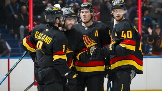 Jan 31, 2026; Vancouver, British Columbia, CAN; Toronto Maple Leafs forward William Nylander (88) battles with Vancouver Canucks forward Jake DeBrusk (74) as goalie Joseph Woll (60) makes a save in overtime at Rogers Arena.