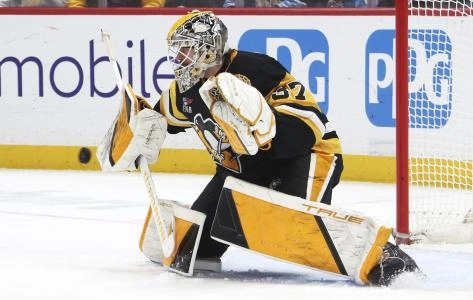 Feb 2, 2026; Pittsburgh, Pennsylvania, USA; Pittsburgh Penguins goaltender Arturs Silovs (37) makes a save against the Ottawa Senators during the second period at PPG Paints Arena.