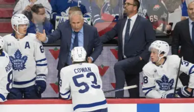 Toronto Maple Leafs head coach Craig Berube speaks with right wing Easton Cowan (53) in the third period against the Ottawa Senators at the Canadian Tire Centre