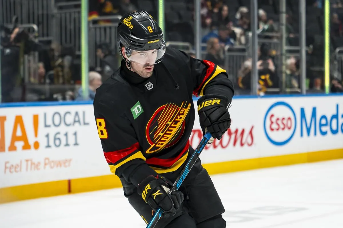 Vancouver Canucks forward Conor Garland (8) handles the puck in warm up prior to a game against the Dallas Stars at Rogers Arena.