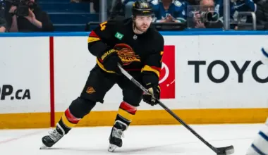 Vancouver Canucks forward Jake DeBrusk (74) handles the puck against the Toronto Maple Leafs in the second period at Rogers Arena