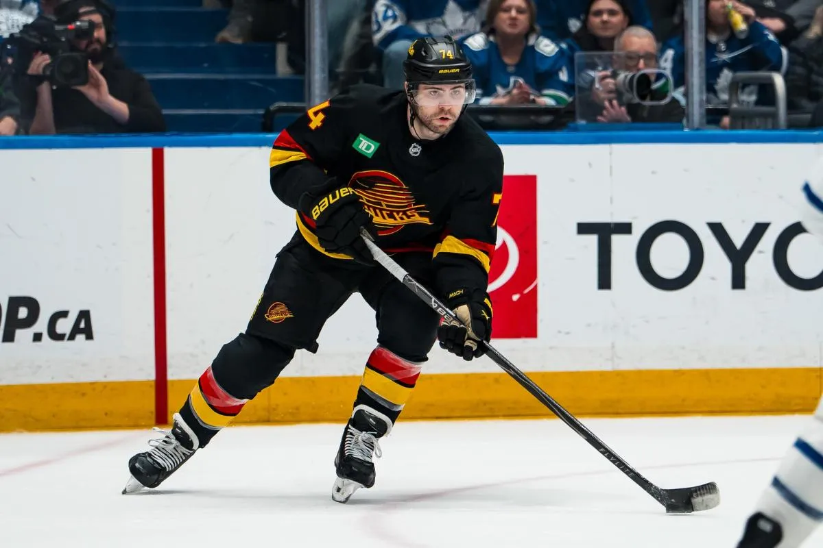 Vancouver Canucks forward Jake DeBrusk (74) handles the puck against the Toronto Maple Leafs in the second period at Rogers Arena
