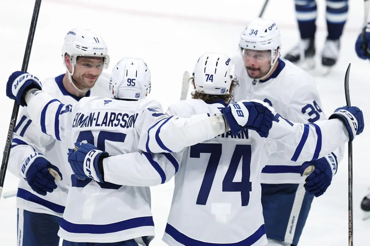 Toronto Maple Leafs center Bobby McMann (74) celebrates his goal against the Winnipeg Jets in the third period at Canada Life Centre.