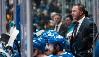 Vancouver Canucks head coach Adam Foote on the bench against the San Jose Sharks in the third period at Rogers Arena.