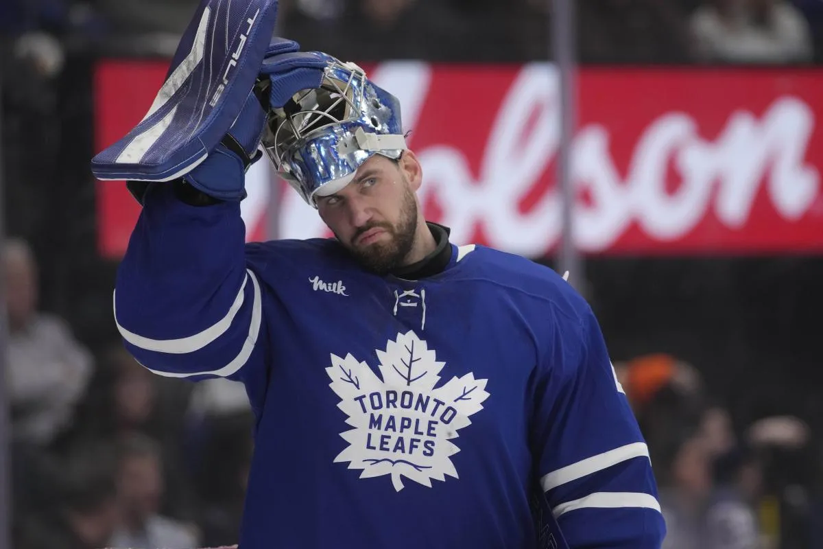 Toronto Maple Leafs goaltender Anthony Stolarz (41) adjusts his helmet during a break in the action against the Philadelphia Flyers at Scotiabank Arena.