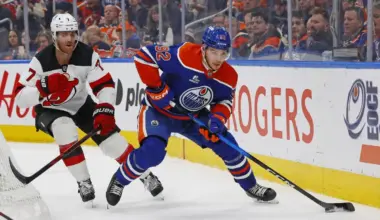 Edmonton Oilers forward Vasily Podkolzin (92) looks to make a pass in front of New Jersey Devils defensemen Dougie Hamilton (7) during the third period at Rogers Place.