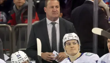 Vancouver Canucks head coach Adam Foote coaches against the New York Rangers during the first period at Madison Square Garden.