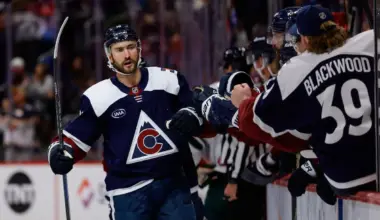 Colorado Avalanche center Nicolas Roy (10) celebrates with the bench after his goal in the third period against the Minnesota Wild at Ball Arena