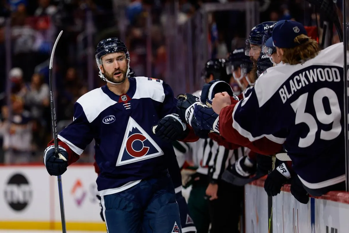 Colorado Avalanche center Nicolas Roy (10) celebrates with the bench after his goal in the third period against the Minnesota Wild at Ball Arena