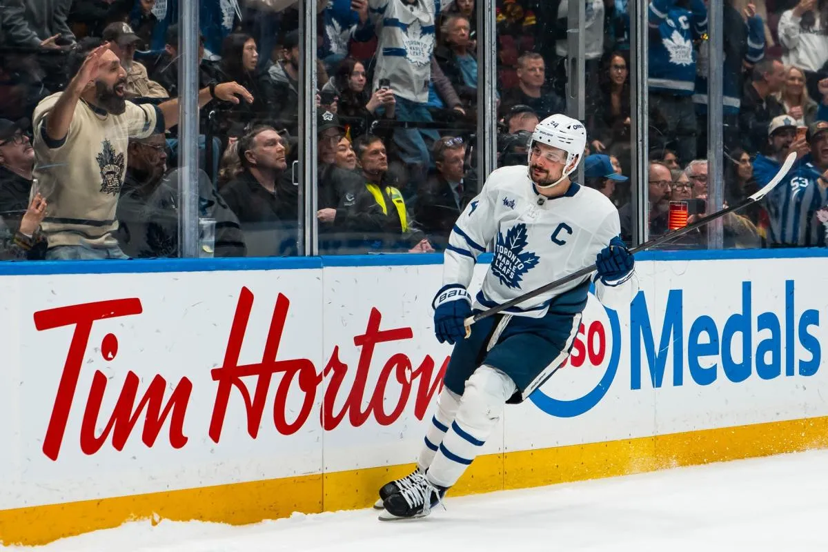 Toronto Maple Leafs forward Auston Matthews (34) celebrates his game winning shootout goal against the Vancouver Canucks at Rogers Arena.