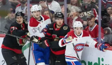 Ottawa Senators centers Ridly Greig (71) and Shane Pinto (12) follow the puck after battling with Montreal Canadiens defensemen Noah Dobson (53) and Lane Hutson (48) in the third period at the Canadian Tire Centre.
