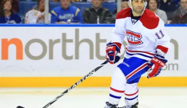Montreal Canadiens center Scott Gomez (11) during play in the game against the Buffalo Sabres at the First Niagara Center. The Canadiens beat the Sabres 4-3 in a shootout.