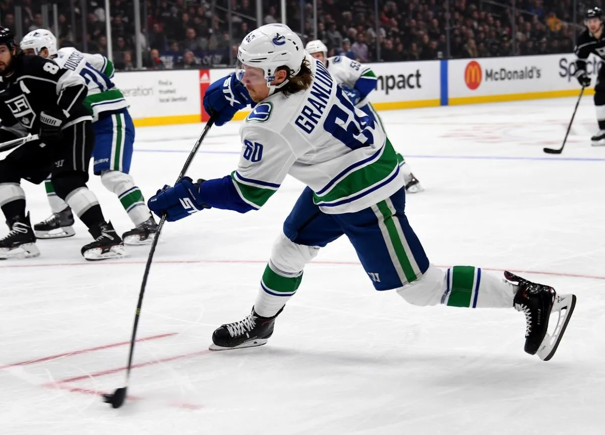 Vancouver Canucks center Markus Granlund (60) takes a shot on goal in the first period against the Los Angeles Kings at Staples Center.