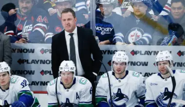 Vancouver Canucks head coach Adam Foote ponders strategy against the Winnipeg Jets during the second period at Canada Life Centre.