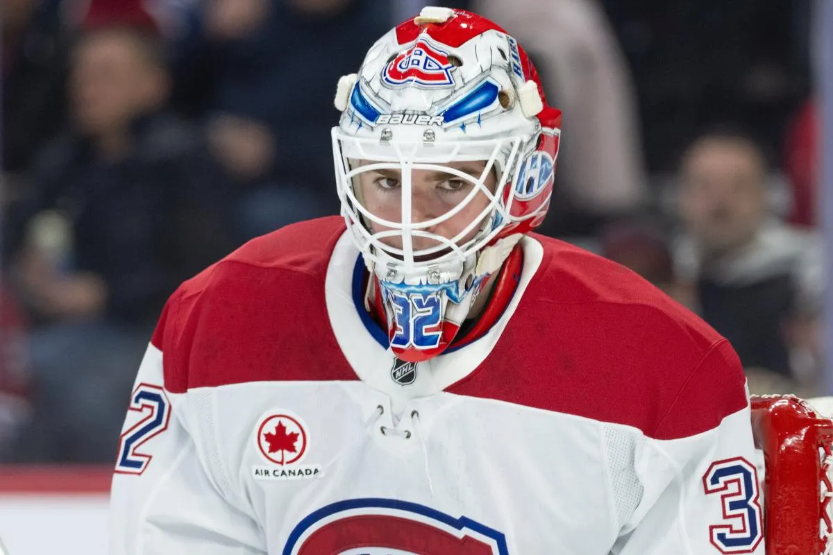 Montreal Canadiens goalie Jacob Fowler (32) looks over prior to the start of game against the Ottawa Senators at the Canadian Tire Centre.