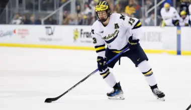 Michigan Wolverines forward T.J. Hughes (13) skates with the puck against Penn State during a Big Ten Tournament quarter final game at Yost Arena.
