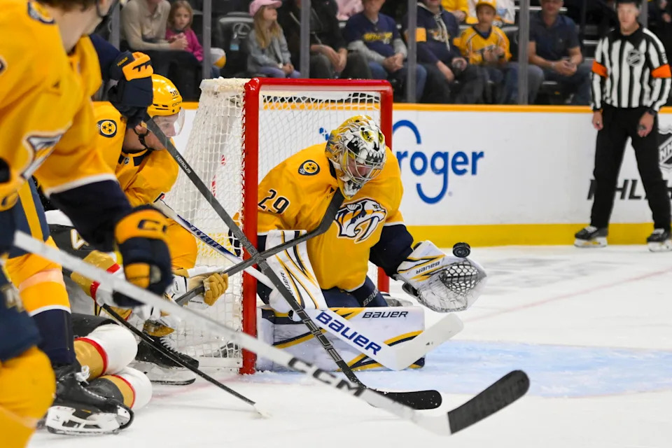 Mar 21, 2026; Nashville, Tennessee, USA; Nashville Predators goaltender Justus Annunen (29) blocks the shot of Vegas Golden Knights left wing Ivan Barbashev (49) during the second period at Bridgestone Arena. Mandatory Credit: Steve Roberts-Imagn Images