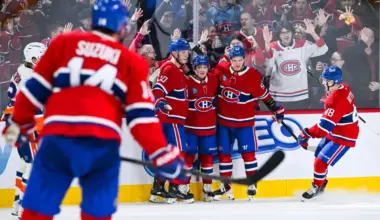 Montreal Canadiens right wing Cole Caufield (13) celebrates with eft wing Juraj Slafkovsky (20) and right wing Ivan Demidov (93) his third goal of the game against the New York Islanders during the third period at Bell Centre.