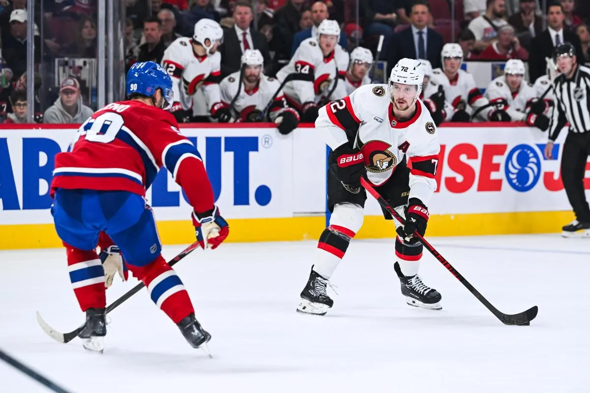 Ottawa Senators defenseman Thomas Chabot (72) plays the puck against Montreal Canadiens center Joe Veleno (90) during the second period at Bell Centre.