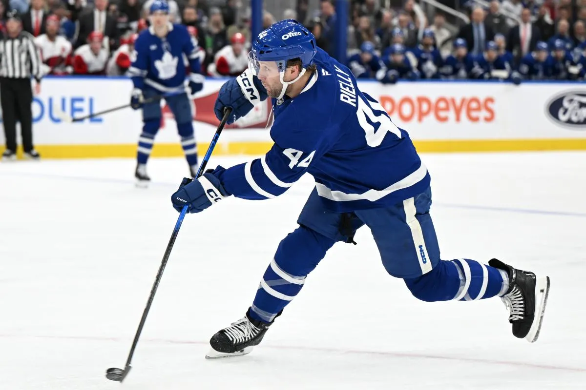 Toronto Maple Leafs defenseman Morgan Rielly (44) hits a slapshot against the Carolina Hurricanes in the first period at Scotiabank Arena.