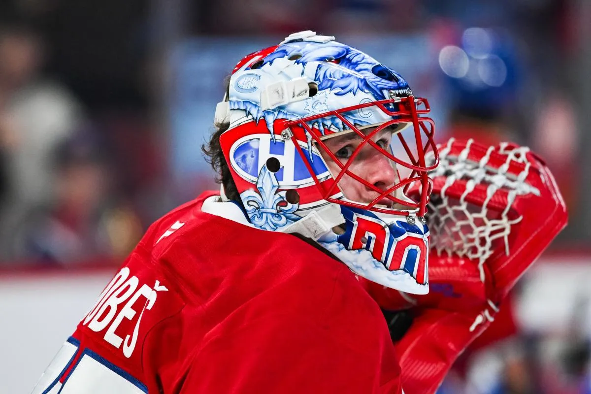 Montreal Canadiens goalie Jakub Dobes (75 looks on during warm-up before the game against the San Jose Sharks at Bell Centre.
