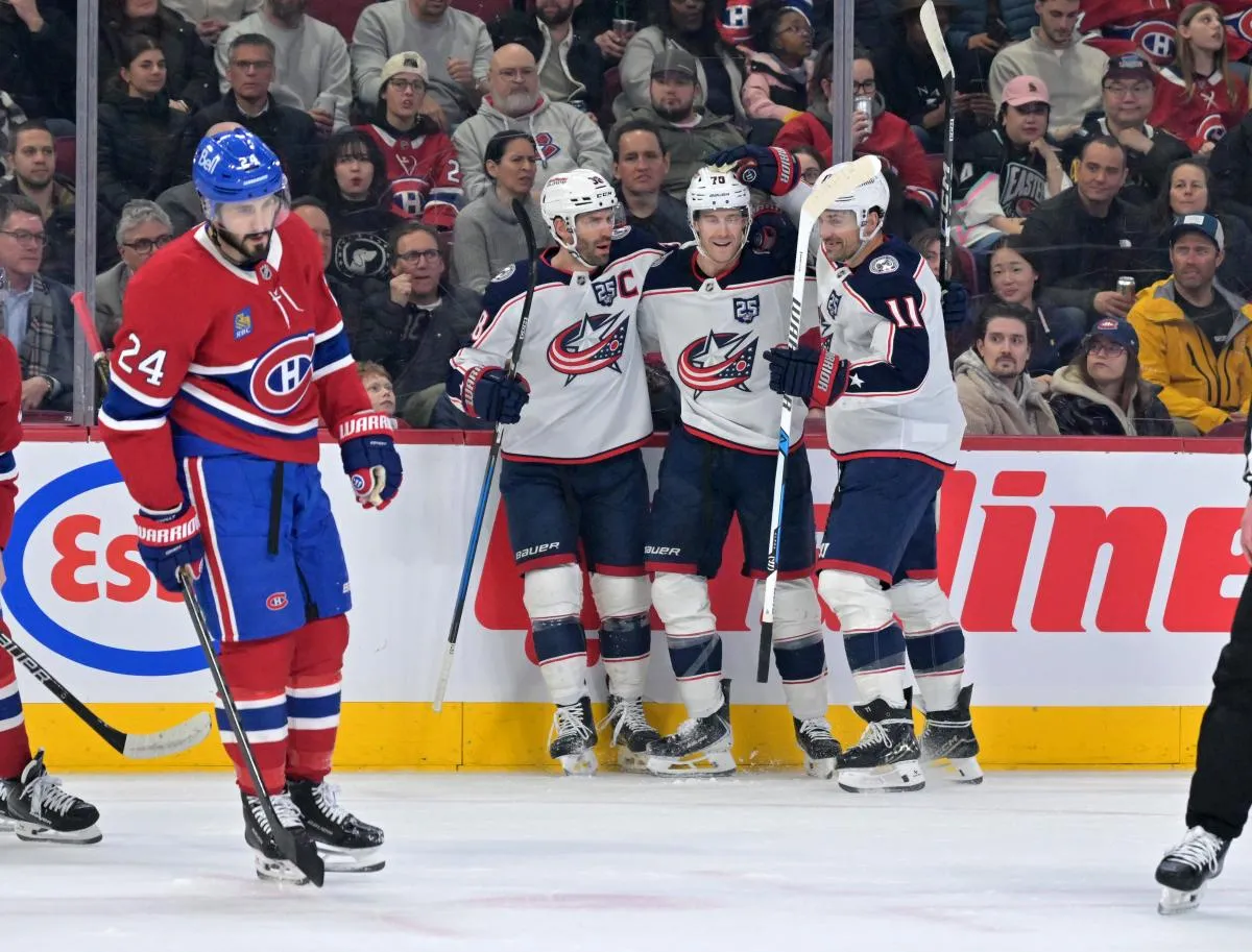 Columbus Blue Jackets defenseman Damon Severson (78) celebrates with teammates after scoring a goal against the Montreal Canadiens during the first period at the Bell Centre.